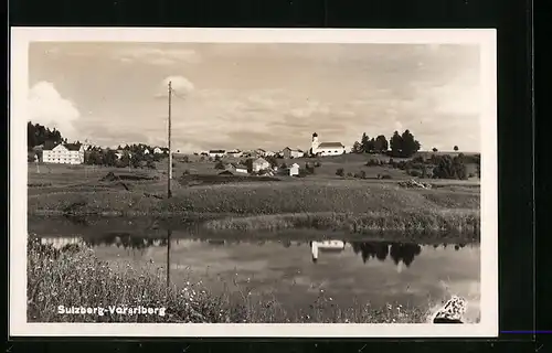 AK Sulzberg, Ortspanorama hinter Gewässer und Feldern