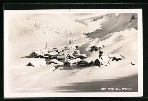 AK Stuben am Arlberg, Teilansicht mit Kirche im Schnee