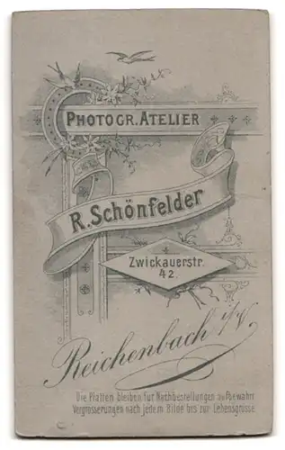 Fotografie R. Schönfelder, Reichenbach i. V., junger Knabe mit Zuckertüte und Ranzen zum Schulanfang