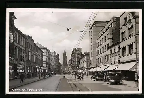 AK Krefeld, strasse mit Geschäften
