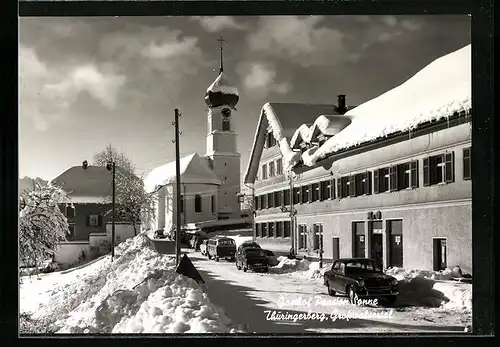 AK Thüringerberg /Grosswalsertal, Gasthof Pension Sonne und Kirche im Schnee