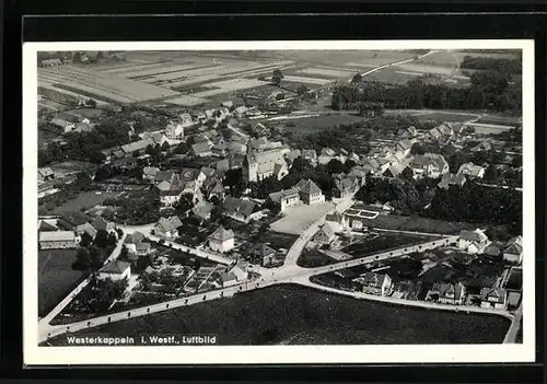 AK Westerkappeln i. Westf., Teilansicht mit Kirche u. Strassenpartie