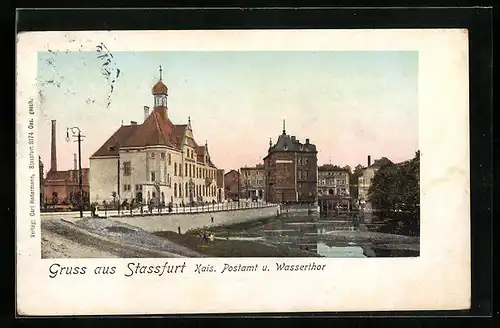 AK Stassfurt, Partie am Kaiserlichen Postamt und Wasserthor mit leuchtenden Fenstern