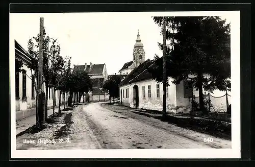 AK Unter-Retzbach, Strassenpartie mit Blick zur Kirche