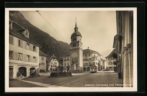 AK Alsdorf, Strassenbahn auf dem Dorfplatz mit Telldenkmal