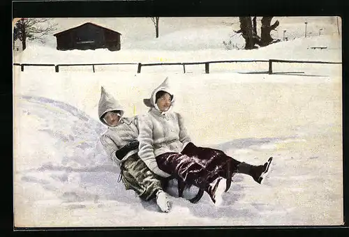 Künstler-AK Geschwisterpaar beim Schlittenfahren