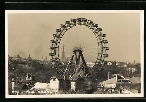 AK Wien, Prater, Riesenrad vor Silhouette der Innenstadt