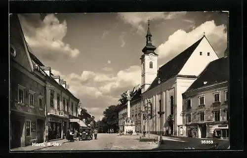AK Horn, Strassenpartie mit Kirche, Geschäften und Denkmal