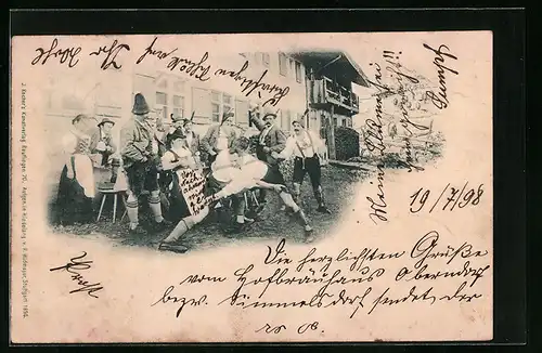 AK Bayern in Tracht beim Ringen