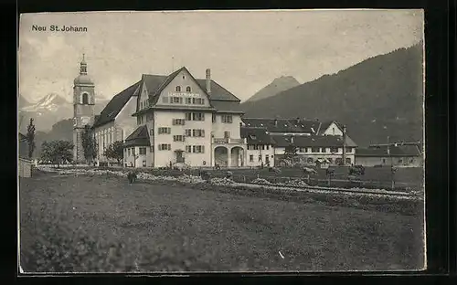 AK Neu St. Johann, Ortsansicht mit Kirche und Schüler-Heim