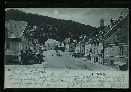 Mondschein-AK Friesach, Platz mit Brunnen