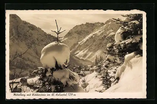 AK Mittelberg, Ortsansicht mit Widderstein im Winter