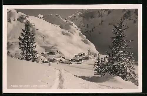 AK Stuben a. Arlberg, Blick auf den eingeschneiten Ort