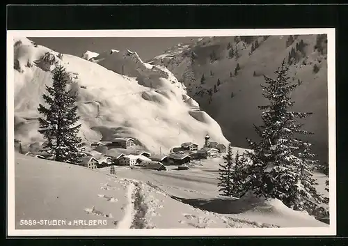 AK Stuben am Arlberg, Blick auf den verschneiten Ort
