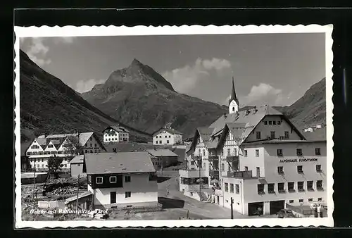 AK Galtür, Ortsansicht mit Alpenhaus