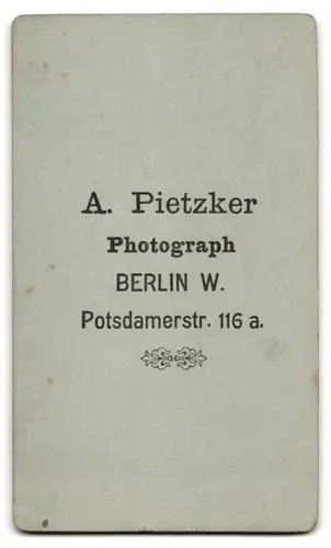 Fotografie A. Pietzker, Berlin, Potsdamerstr. 116 a, Kleinkind im Mantel Spielzeug-Schaf