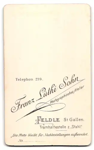 Fotografie F. Lüthi Sohn, Feldle, Herr im Anzug mit Brille und Walrossbart