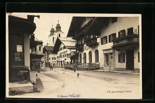AK St. Johann, Ortsansicht mit Rudolf Scheider Herren- und Damenschneider