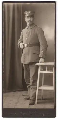 Fotografie Gebr. Strauss, Ludwigshafen, Soldat in Feldgrau Uniform Rgt. 31