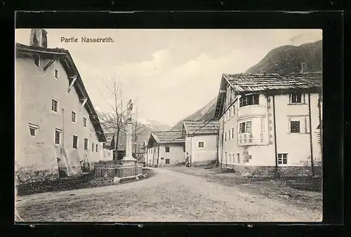 AK Nassereith, Dorfpartie mit Häuseransichten