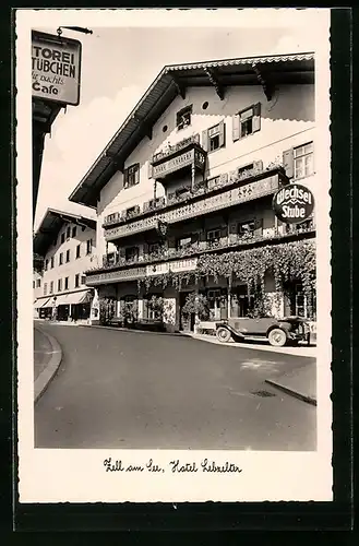 AK Zell am See, Strassenpartie am Hotel Lebzelter