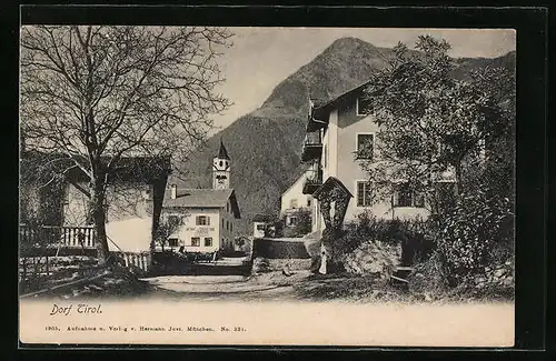 AK Dorf Tirol bei Meran, Ortspartie mit Blick auf Kirchturm und Marterl