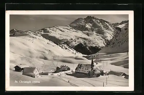 AK St. Christoph, Häuserpartie in verschneiter Landschaft