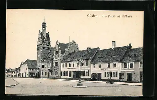AK Güsten, Partie am Markt mit Rathaus, Bäcker- und Fleischergeschäft
