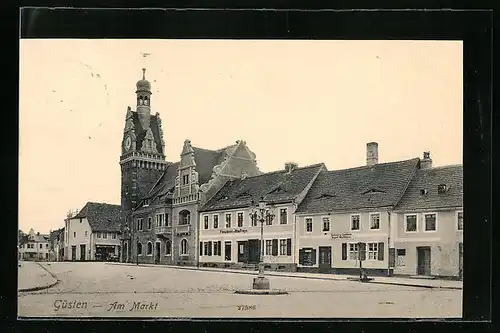 AK Güsten, Partie am Markt mit Rathaus, Bäckerei und Fleischerei