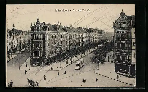 AK Düsseldorf, Graf Adolfstrasse mit Geschäften und Strassenbahn