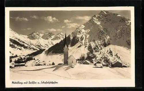 AK Mittelberg, Ortsansicht mit Kirche und Blick auf Zwölfer und Schafalpköpfen