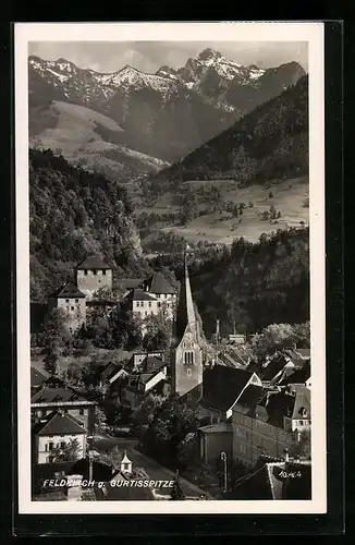 AK Feldkirch, Ortspartie mit Kirche und Blick zur Gurtisspitze