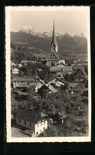 AK Imst, Teilansicht mit Kirche und Mieminger Alpen