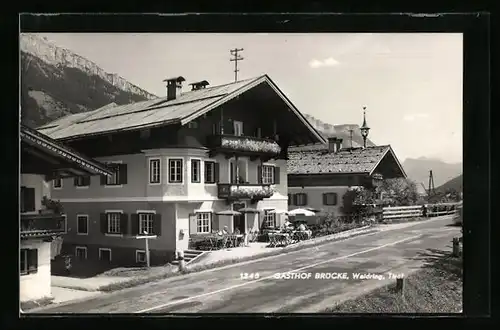 AK Waidring, Strassenpartie mit Gasthof Brücke