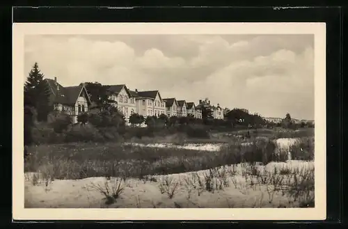 AK Ahlbeck / Seebad, Häuser am Strand