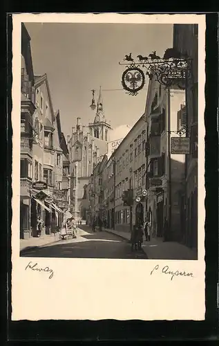 Foto-AK Schwaz, Strassenpartie mit Gasthaus und Geschäften