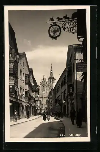 AK Schwaz, Strassenpartie mit Gasthaus und Geschäften