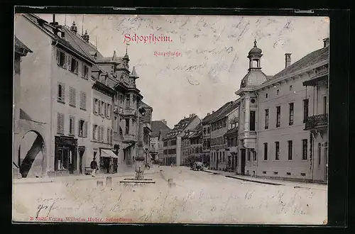 AK Schopfheim, Hauptstrasse mit Geschäften und Brunnen