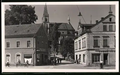 Fotografie Brück & Sohn Meissen, Ansicht Schirgiswalde, Blick auf Geschäft Jos. Lödmann Sen. Nachf. und Ernst Teubner