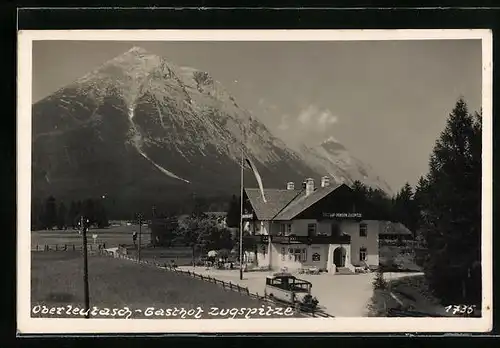 AK Oberleutasch, Gasthof Zugspitze mit Oldtimer