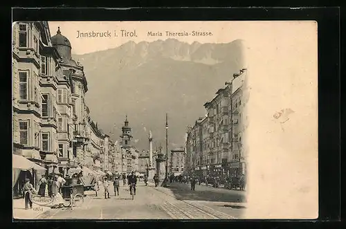 AK Innsbruck, Maria Theresiastrasse mit Geschäften, Denkmal und Litfasssäule