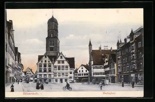 AK Biberach, Marktplatz mit Geschäften und Radfahrer