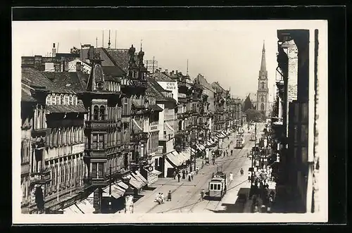 AK Karlsruhe, Partie in der Kaiserstrasse mit Strassenbahn und Blick auf Kirche
