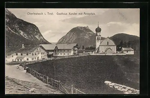 AK Oberleutasch, Gasthaus Xander mit Kirche und Arnspitze