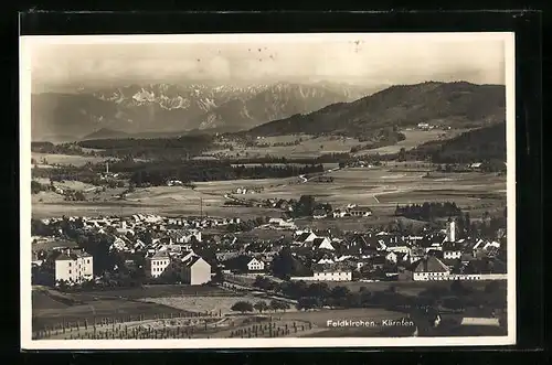 AK Feldkirchen, Ortsansicht mit Blick auf die Alpen