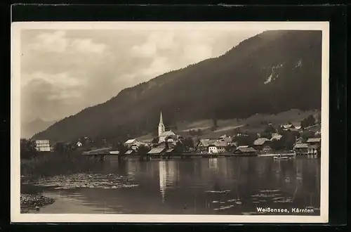 AK Weissensee, Ortsansicht vom See her