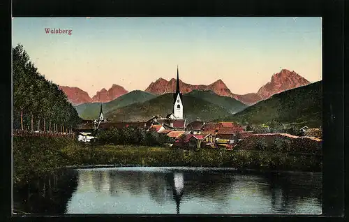 AK Welsberg, am Ufer vor der Kirche