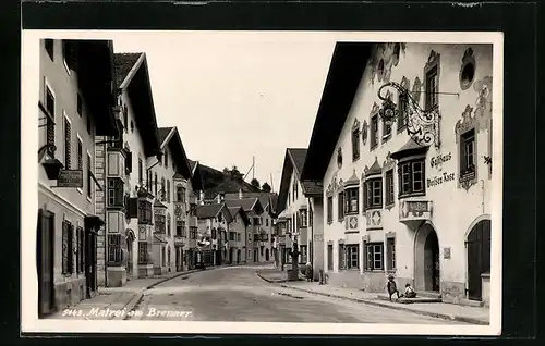 AK Matrei am Brenner, Strassenansicht mit Gasthaus Zur weissen Rose