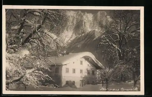 AK Ehrwald, Haus mit Gebirge im Winter