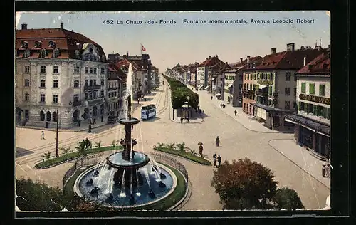 AK La Chaux-de-Fonds, Fontaine monumentale, Avneue Léopold Robert, Strassenbahn